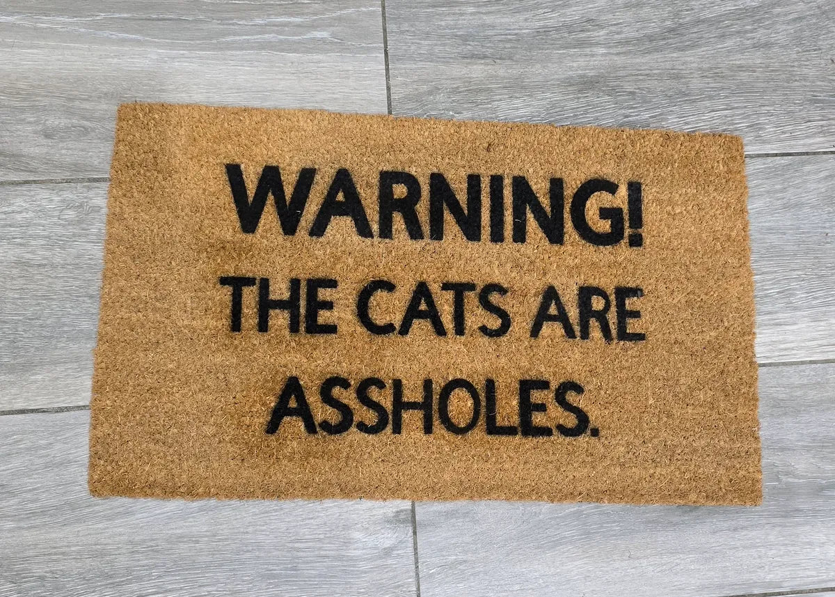 Warning! The Cats Are Assholes