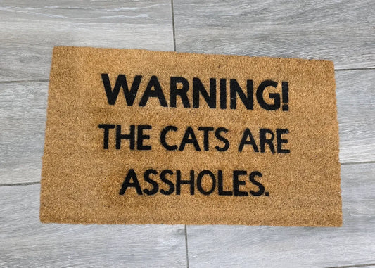 Warning! The Cats Are Assholes